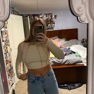 Stitch orange & cream top